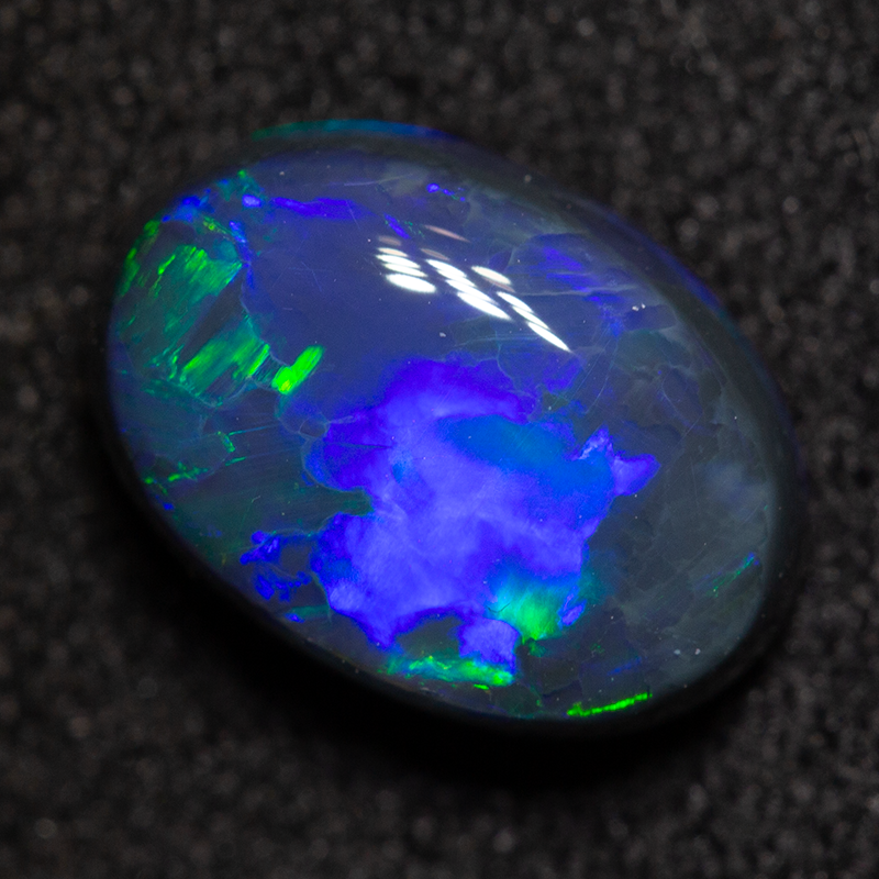 1.95 ct black opal 9.5x6.7x4.6mm