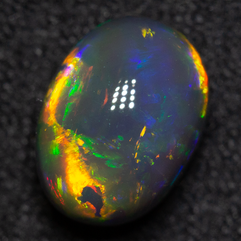 1.95 ct black opal 8.5x6.3x5.7mm