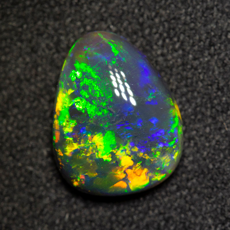1.96 ct black opal 10.4x8.2x3.8mm