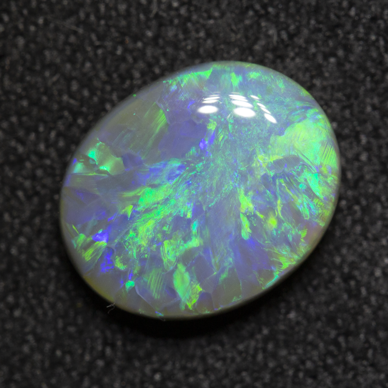 1.99 ct dark opal 9.7x7.9x3.8mm
