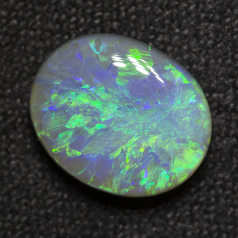 1.99 ct dark opal 9.7x7.9x3.8mm