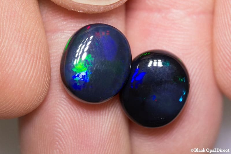 10.20 ct black opal pair 12x11mm