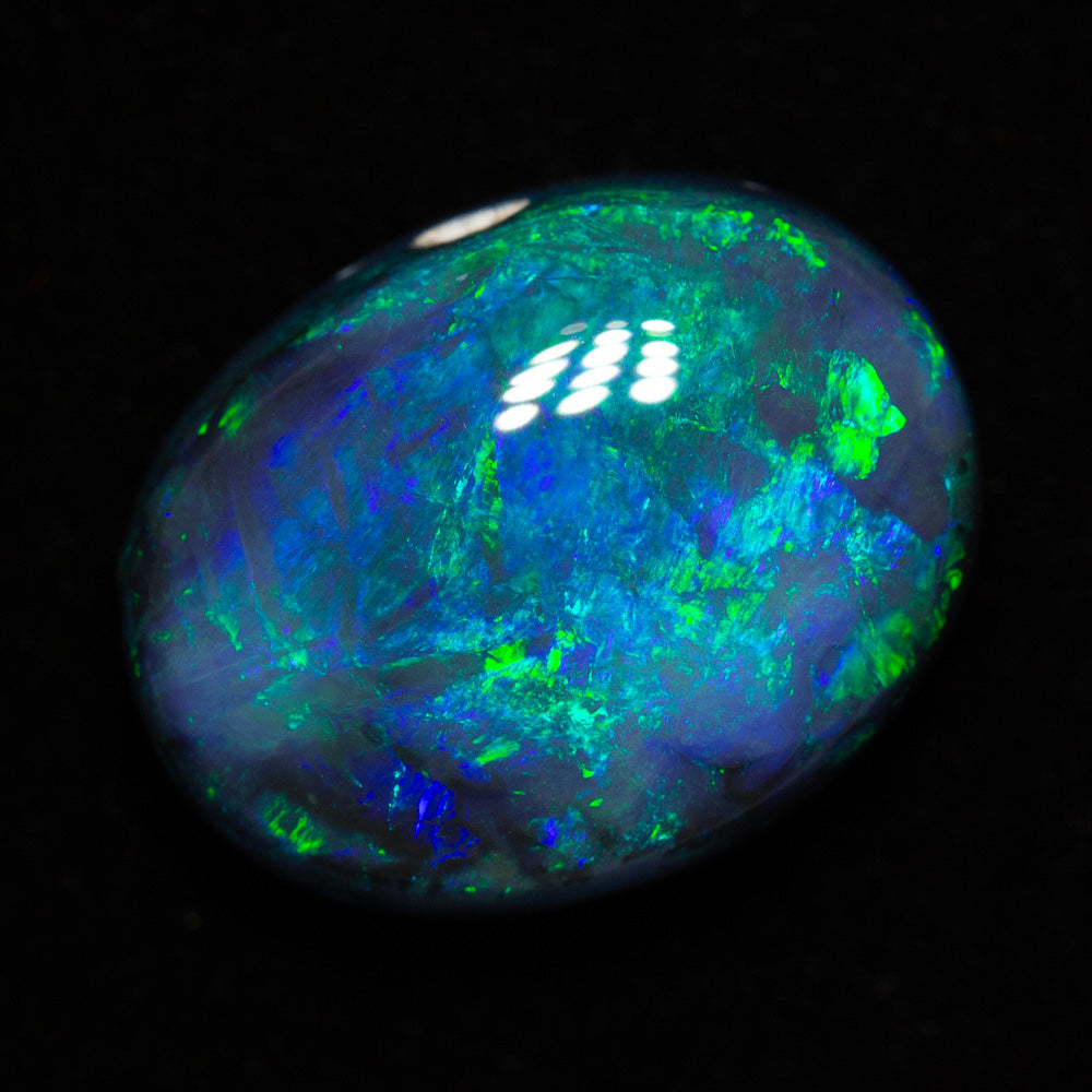 10.30 ct black opal 16.5x12.9x7.6mm