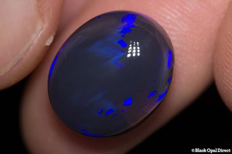 10.43 ct black opal 16x13x7.5mm