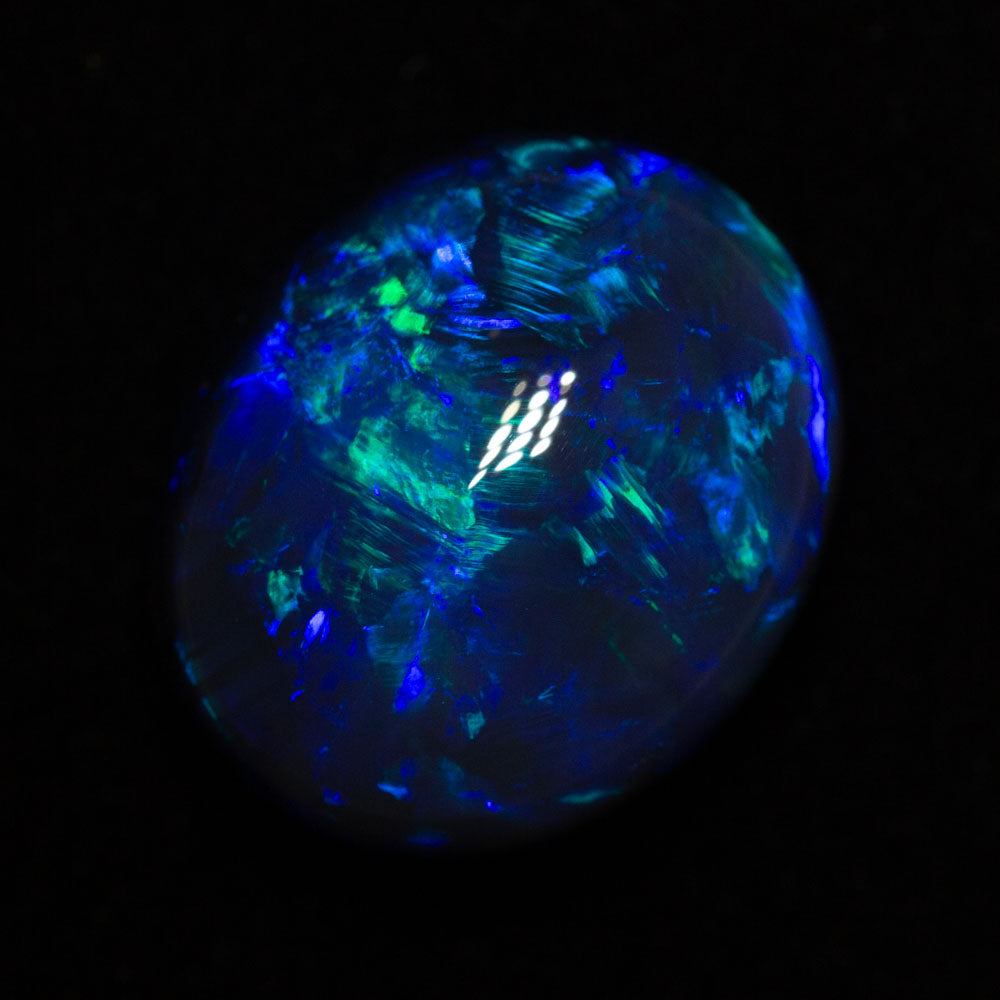 10.55 ct gem black opal 16.8x13x8.8mm