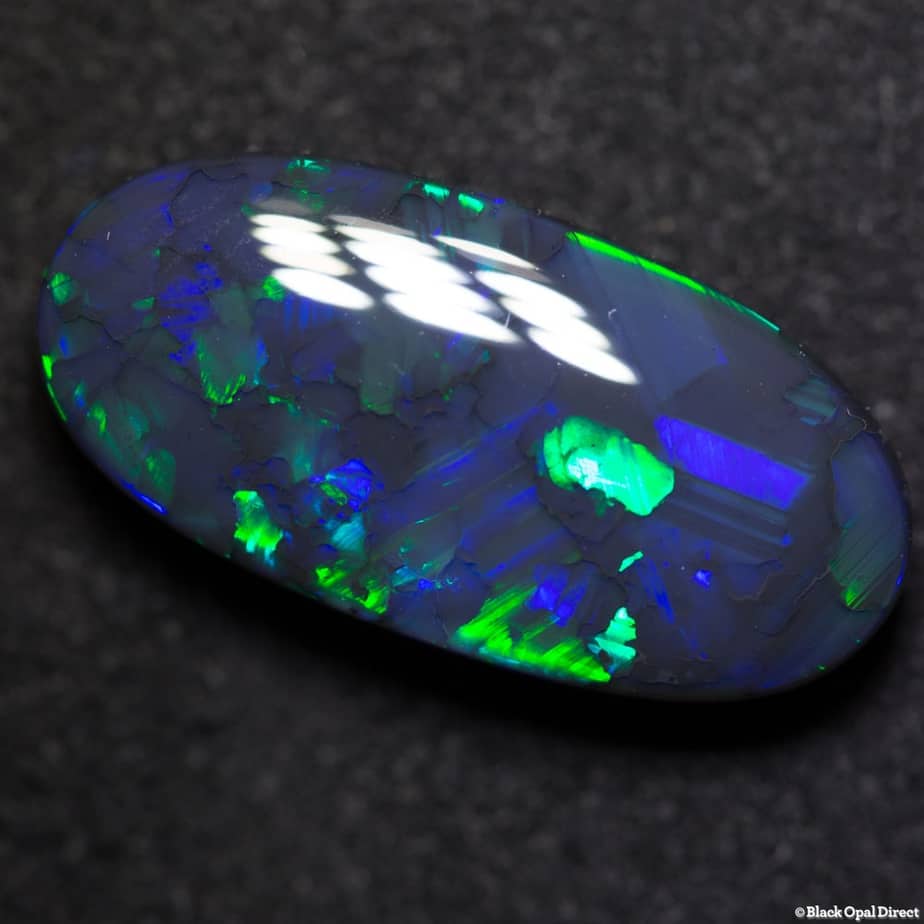 11.28 ct gem black opal 22x11x6mm