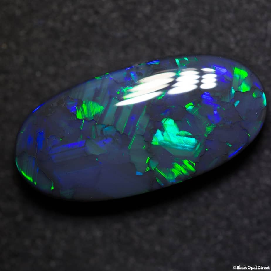 11.28 ct gem black opal 22x11x6mm