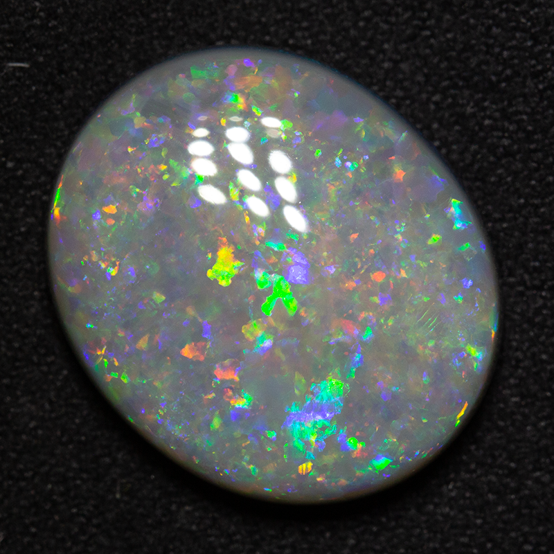 11.41 ct dark opal 18x15x6mm
