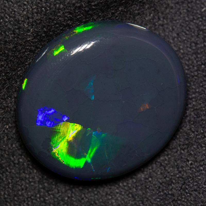 12.01 ct black opal 18x16.2x6.4mm