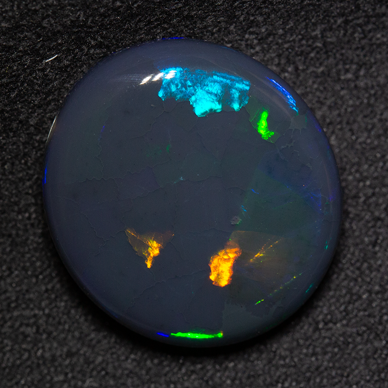 12.01 ct black opal 18x16.2x6.4mm