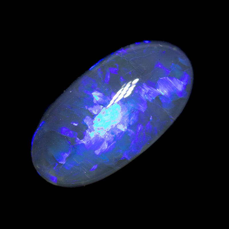 12.80 ct gem black opal 23x12.2x7.2mm