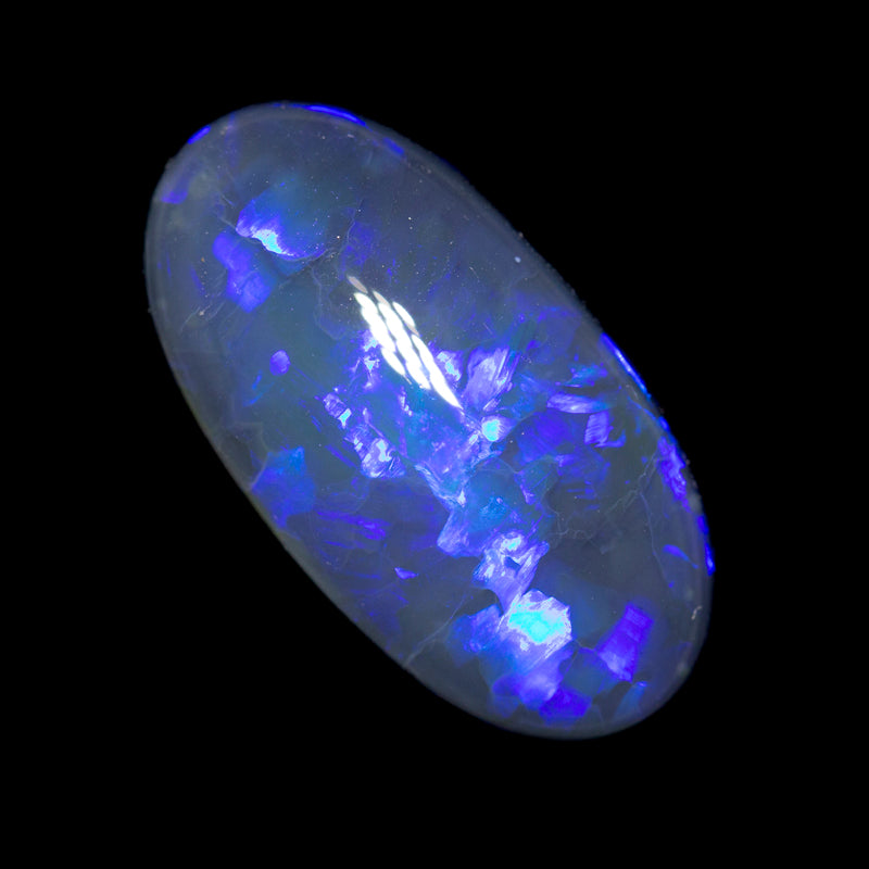 12.80 ct gem black opal 23x12.2x7.2mm