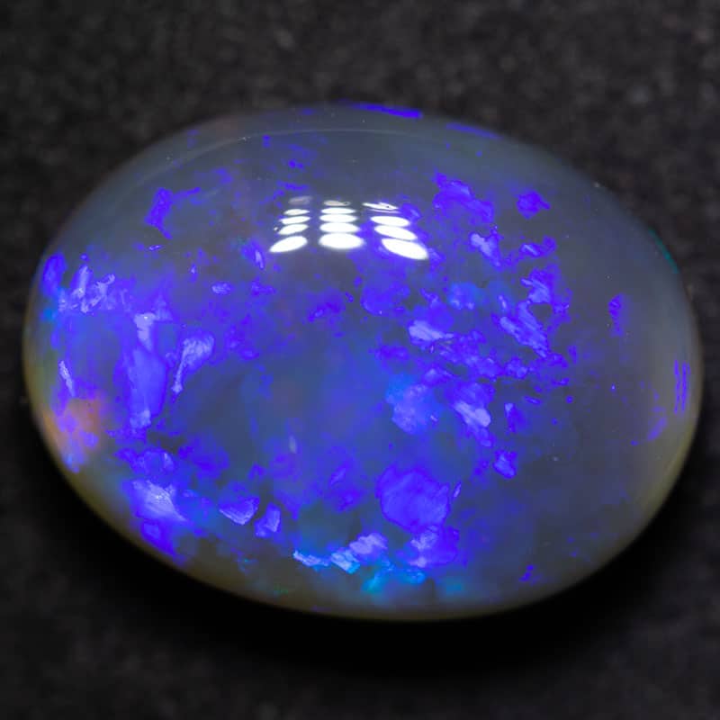 12.96 ct black crystal opal 18x13x8mm
