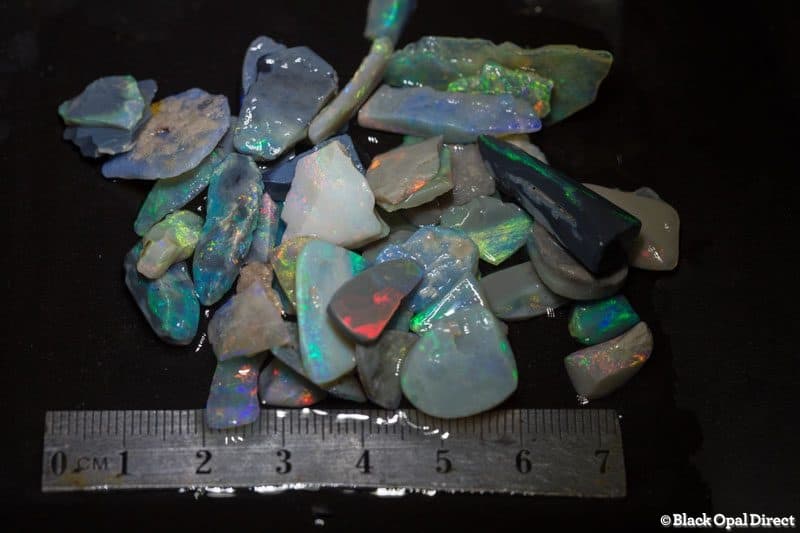 129 ct rough and rubbed opal parcel for intermediate opal cutters