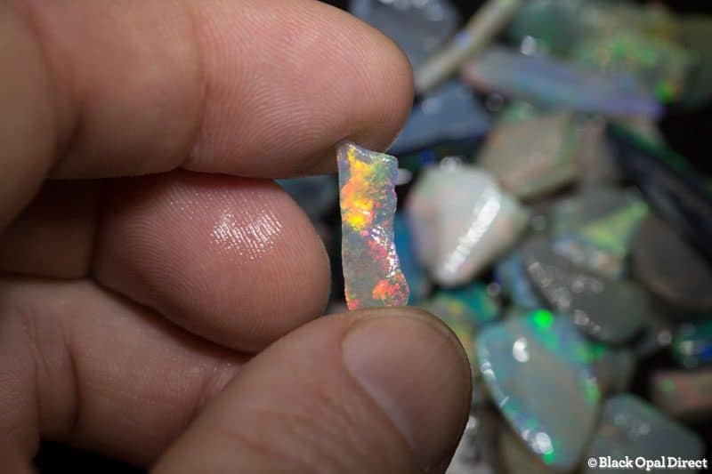 129 ct rough and rubbed opal parcel for intermediate opal cutters