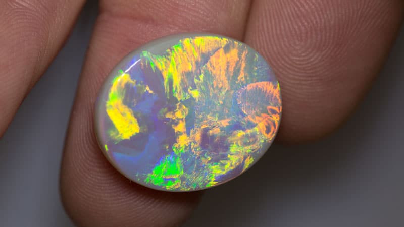 13.53 ct dark opal 25x19x4mm