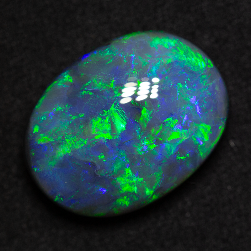13.80 ct black opal 19.1x14.4x7.9mm