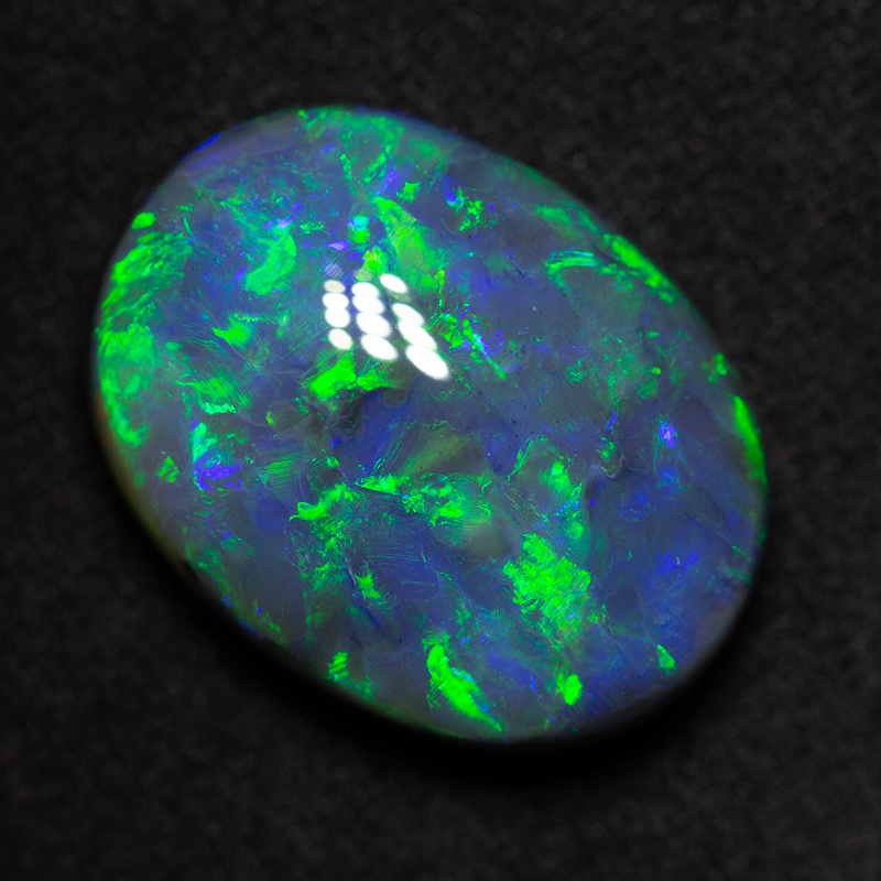 13.80 ct black opal 19.1x14.4x7.9mm