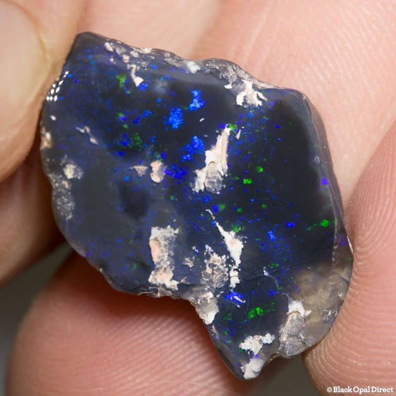 13.92ct polish black raw opal 28x19x4mm