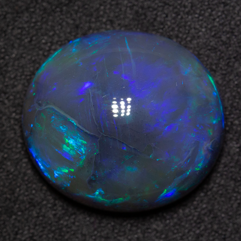 14.98 ct black opal 18.1x16.3x8.9mm