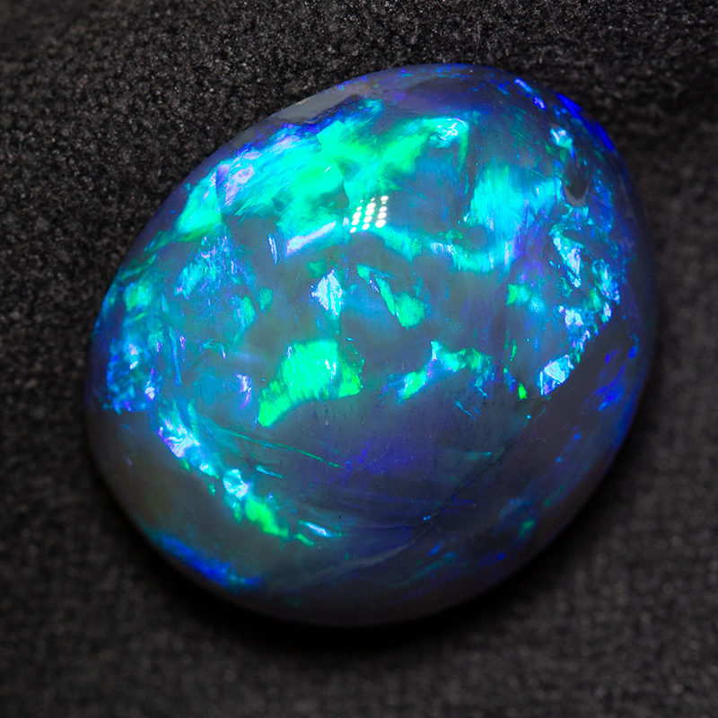14.98 ct black opal 18.1x16.3x8.9mm