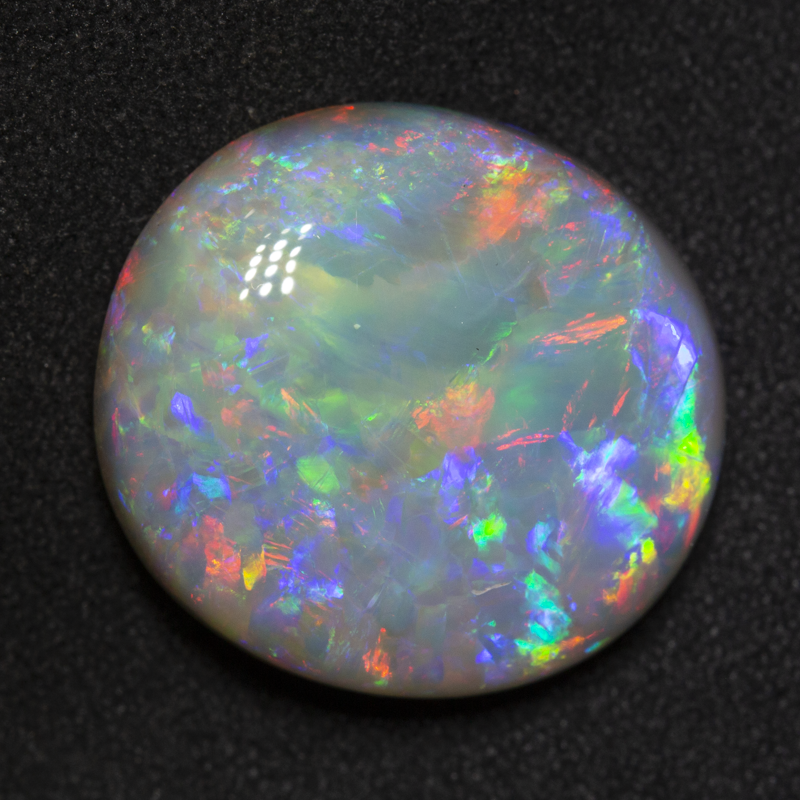 15.69 ct dark opal 18.7x17.4x7.8mm
