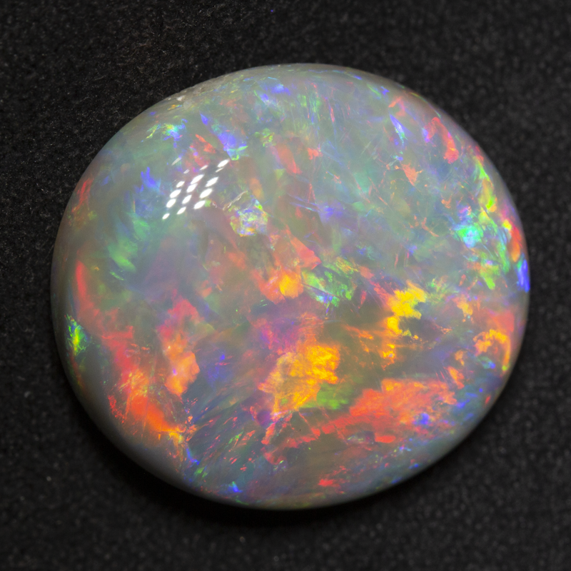 15.69 ct dark opal 18.7x17.4x7.8mm