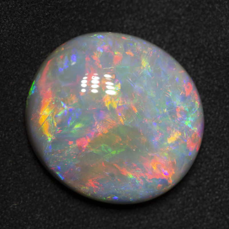 15.69 ct dark opal 18.7x17.4x7.8mm