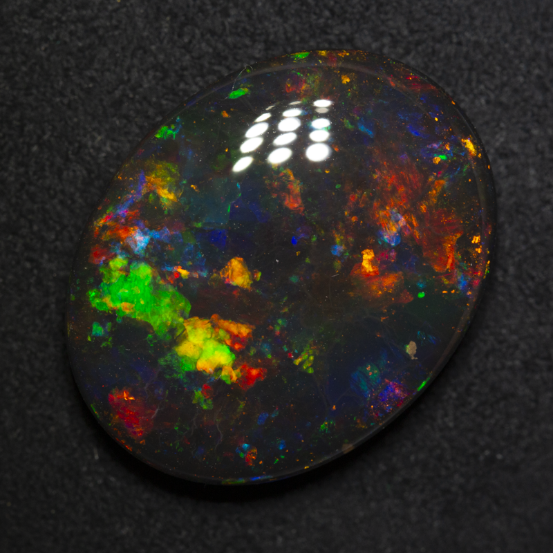 15.83 ct gem black opal 22.2x17.5x6.3mm