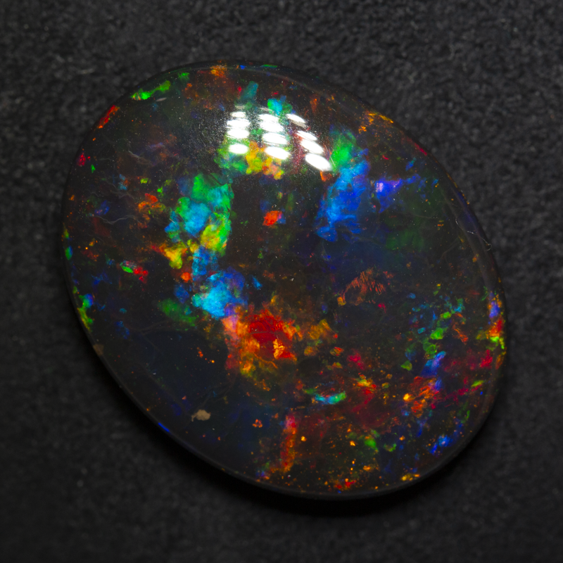 15.83 ct gem black opal 22.2x17.5x6.3mm