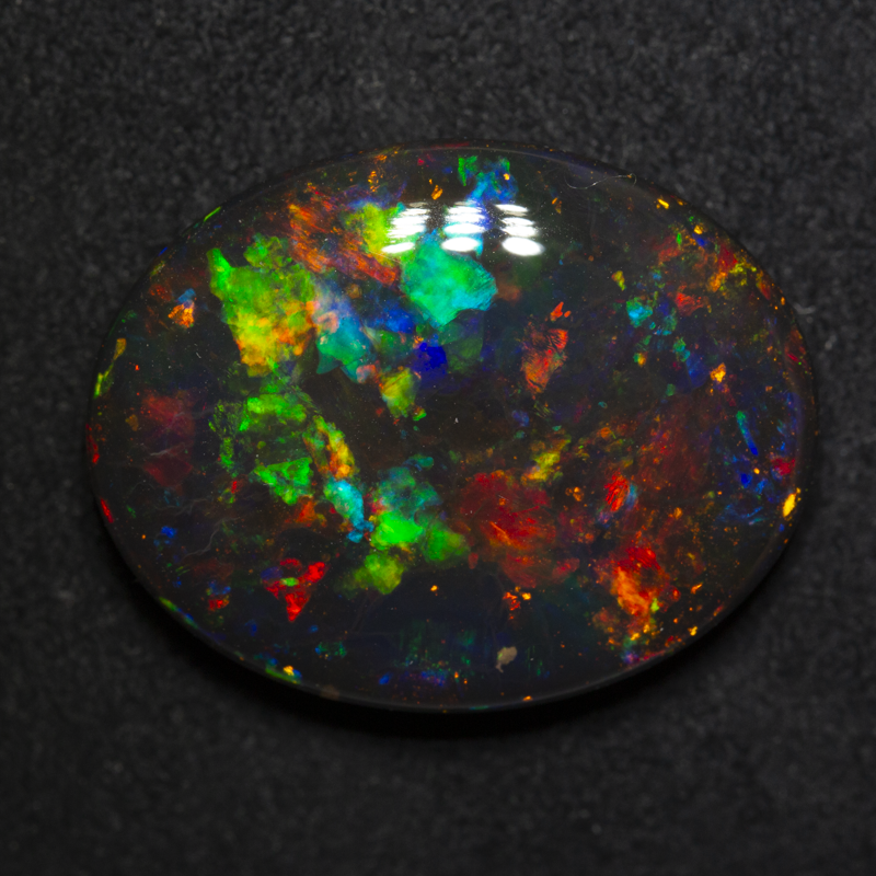15.83 ct gem black opal 22.2x17.5x6.3mm