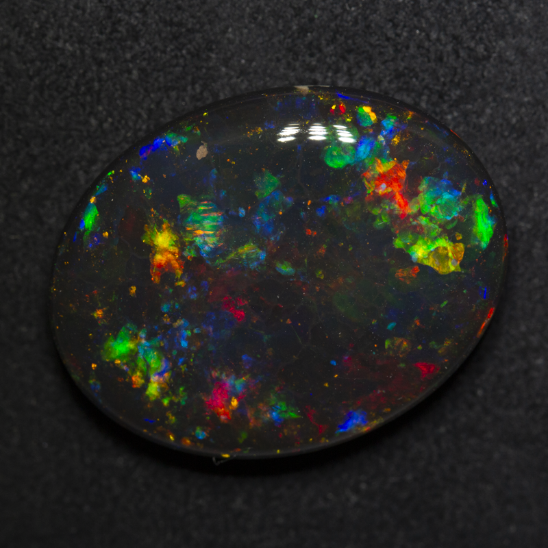 15.83 ct gem black opal 22.2x17.5x6.3mm