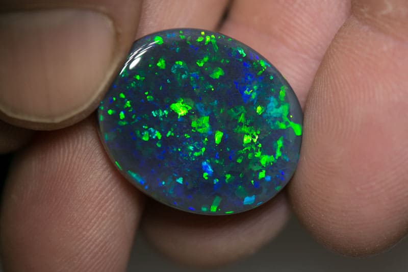 16.69 carat gem black opal 23.5x20x5.5mm