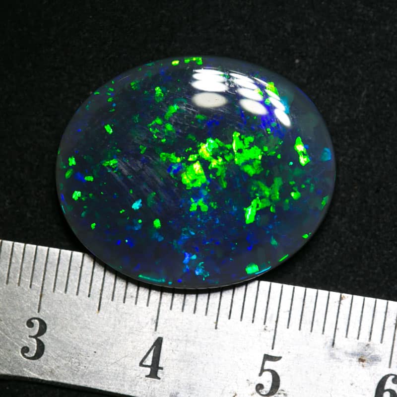16.69 carat gem black opal 23.5x20x5.5mm