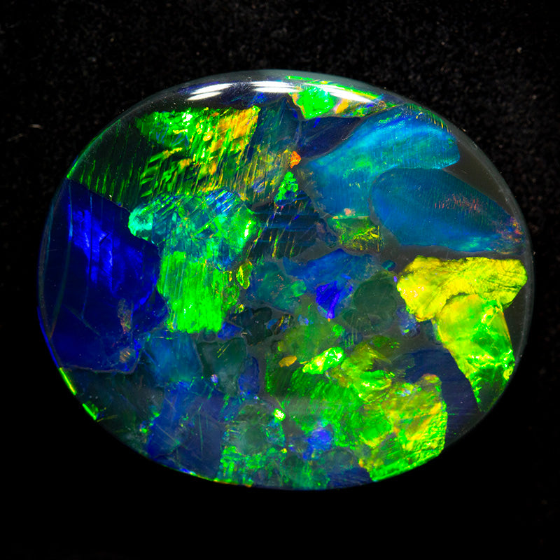 17.56 ct gem black opal 25.7x21.8x4.4mm