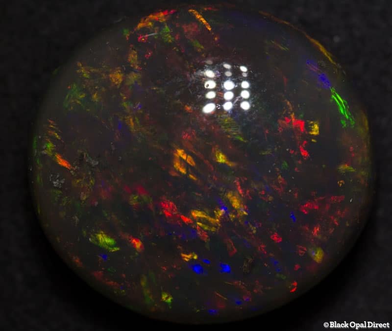 18.56 ct gem black opal 18x17x10mm