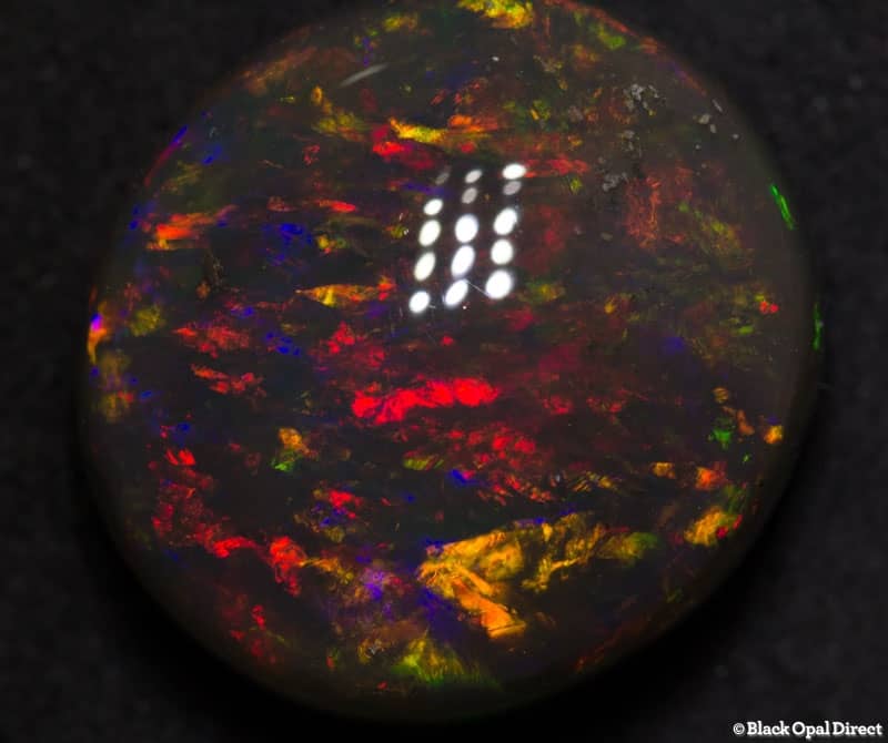 18.56 ct gem black opal 18x17x10mm