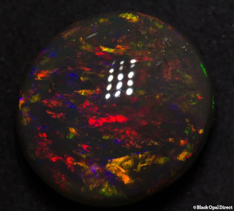 18.56 ct gem black opal 18x17x10mm