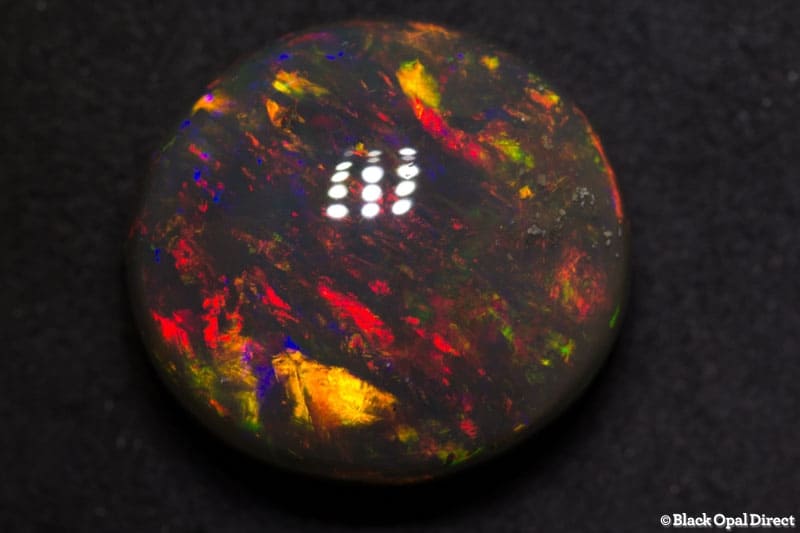 18.56 ct gem black opal 18x17x10mm
