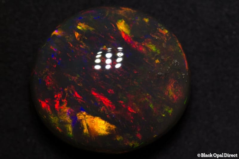18.56 ct gem black opal 18x17x10mm