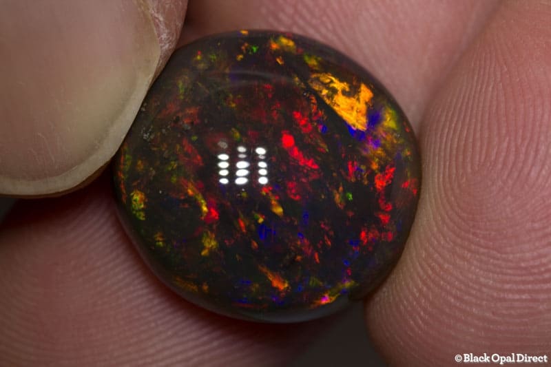 18.56 ct gem black opal 18x17x10mm