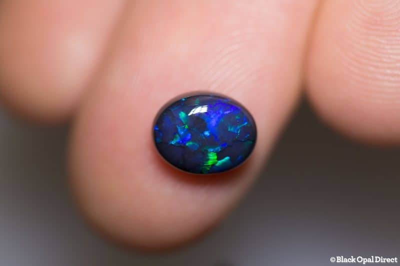 2.20 ct black opal 9.2x7.5x4.5mm