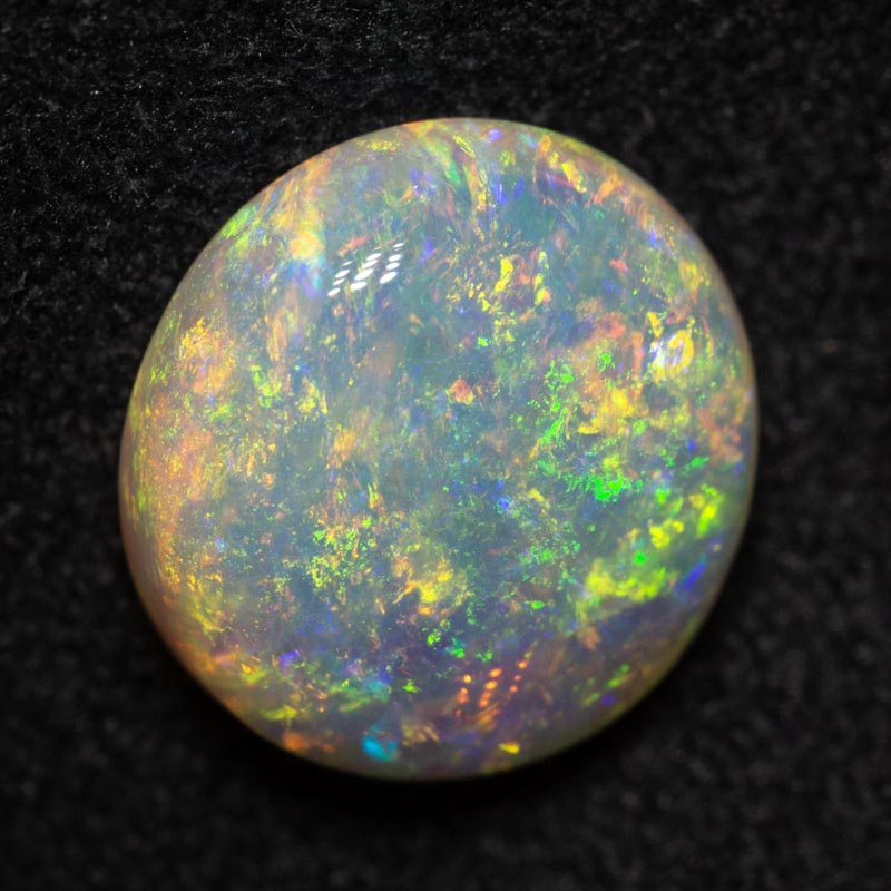 2.23 ct double-sided crystal opal 9.3x8.8x4.2mm