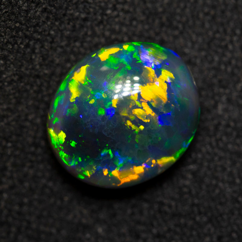 2.24 ct gem black opal 9.4x8.1x4.8mm