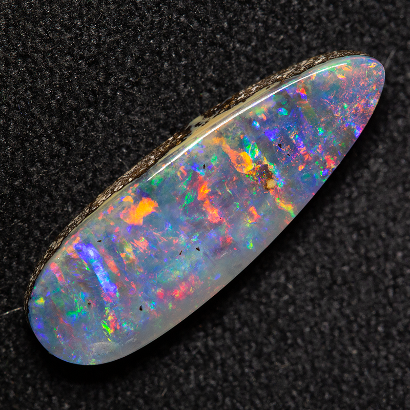 2.24 ct boulder opal 16.2x5.3x2.9mm