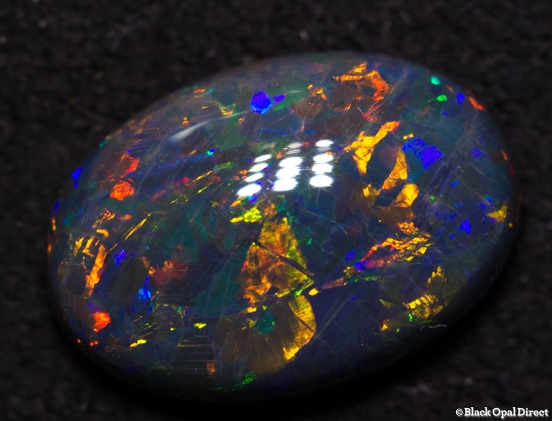 2.24 ct double sided black opal gem 11.5x5x4mm