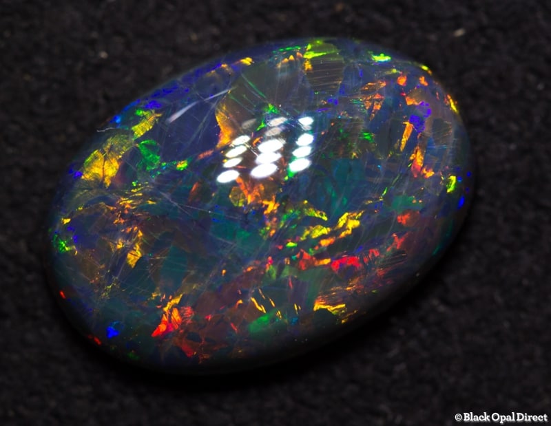 2.24 ct double sided black opal gem 11.5x5x4mm