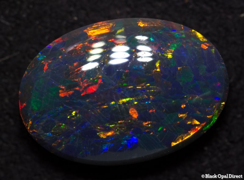 2.24 ct double sided black opal gem 11.5x5x4mm