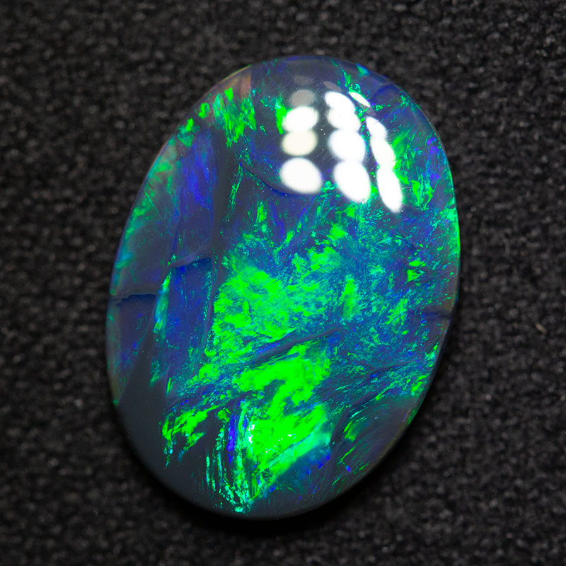 2.26 ct black opal 13.1x9.6x2.7mm