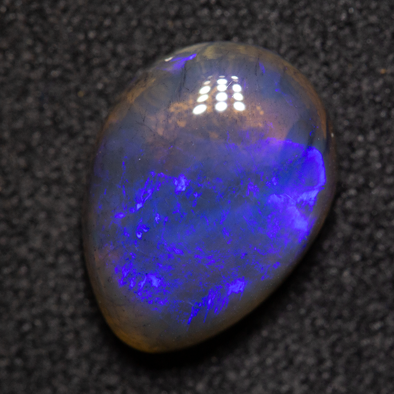 2.27 ct black crystal opal 10.9x8.1x4mm